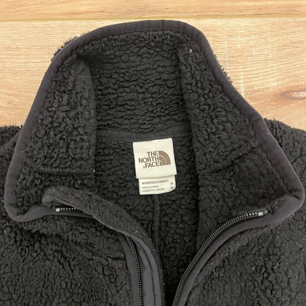 The North Face Black Sherpa Vest, size medium